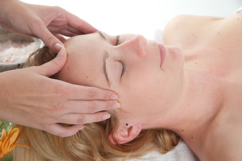 lady giving patient a craniosacral massage
